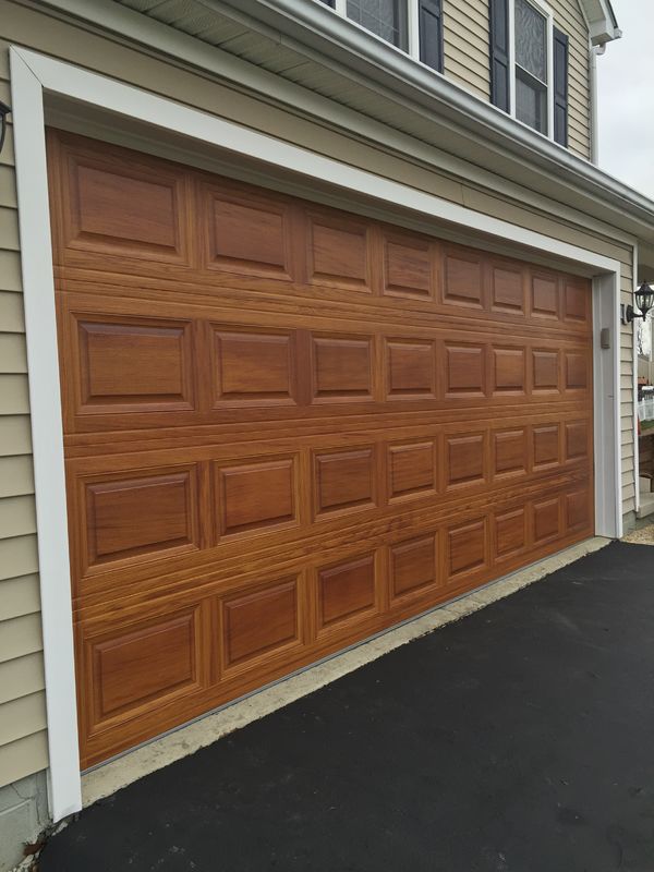 Cedar Panel Garage Doors Garage doors with raised cedar panel in San Jose, CA