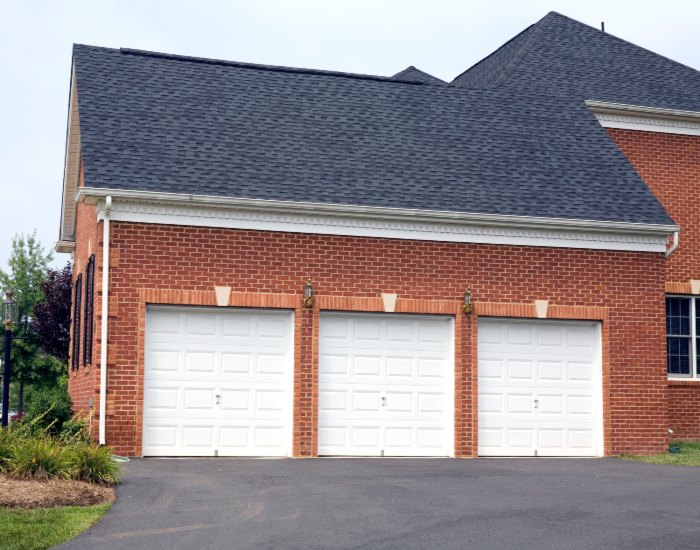 A House With Sectional Garage Doors In San Jose, CA